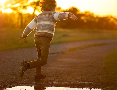 young boy running